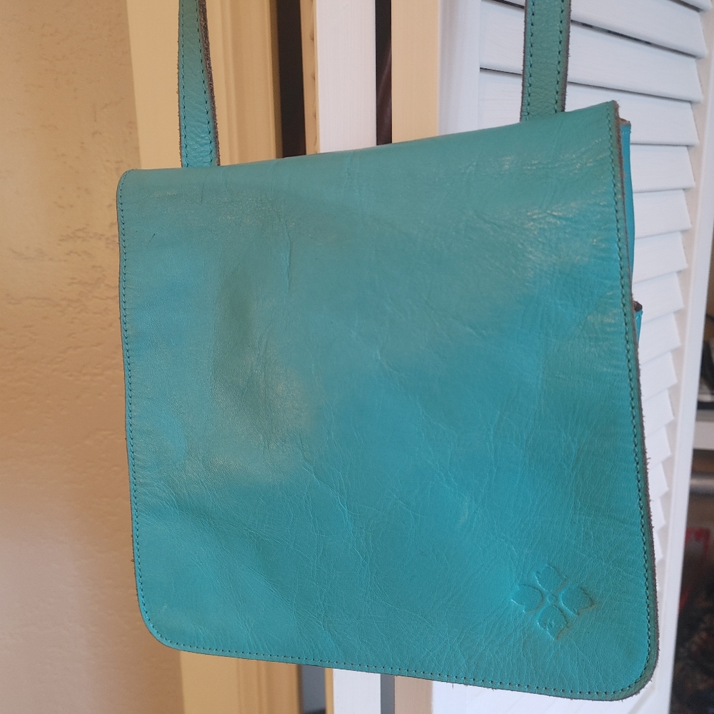 Teal Patricia Nash crossbody purse.